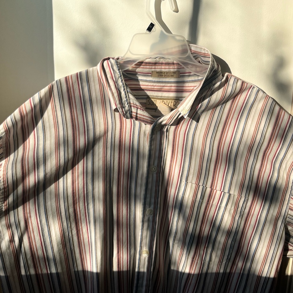 Male hipster button-up multicolor sun-river shirt.